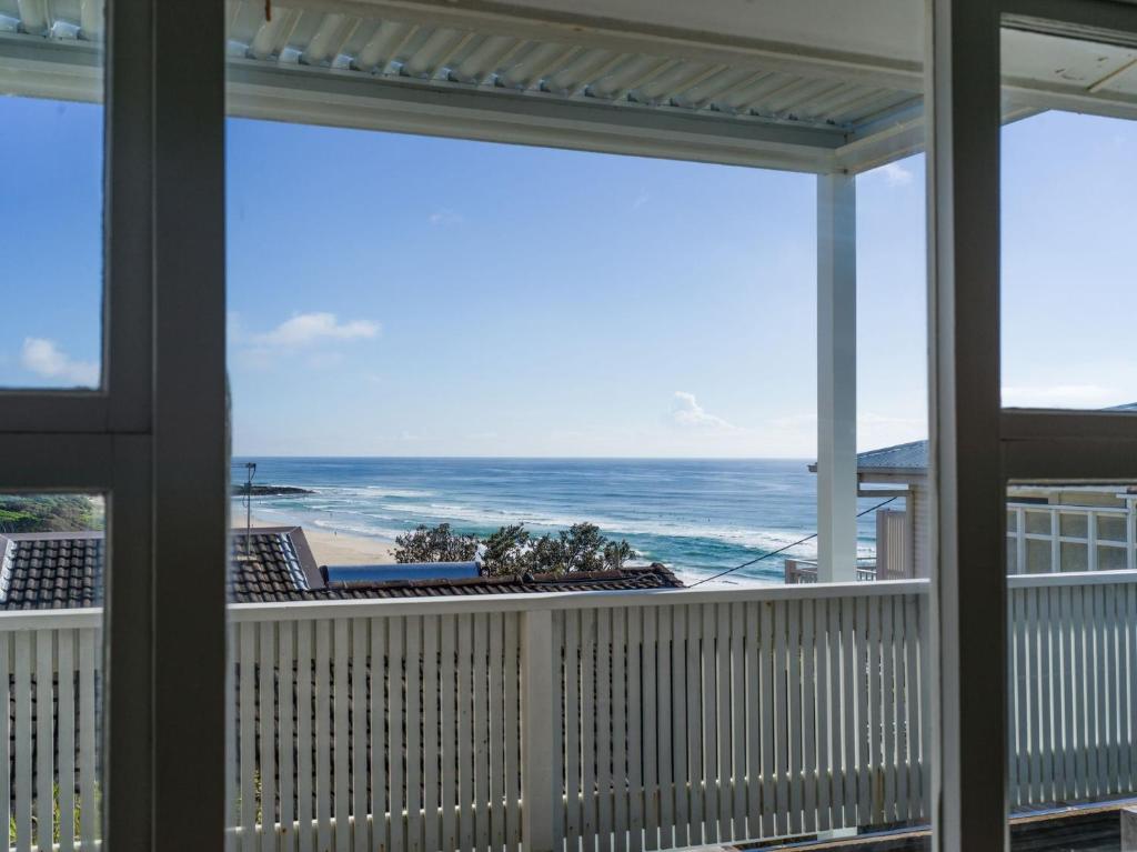 a view of the ocean from a balcony at Walters in East Ballina