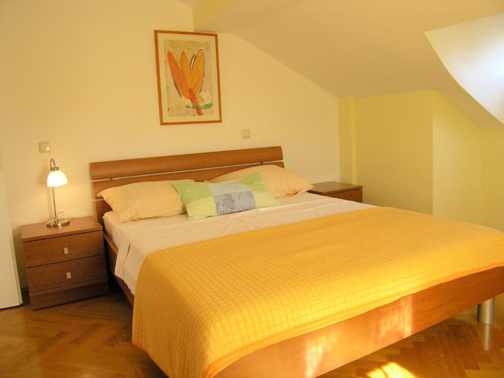 Posteľ alebo postele v izbe v ubytovaní Apartments Kristina