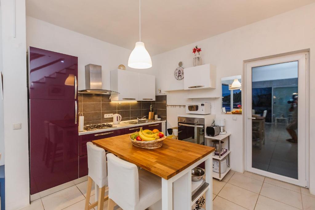 Kuchyň nebo kuchyňský kout v ubytování Villa Casabianca