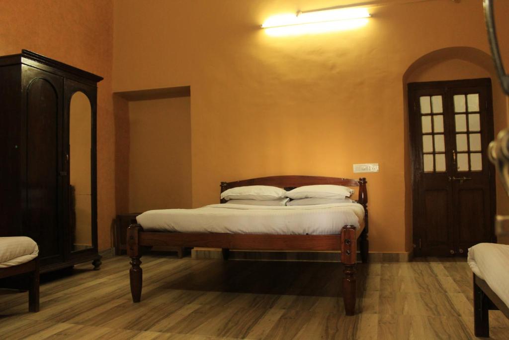 Postel nebo postele na pokoji v ubytování Hotel Mount View Heritage