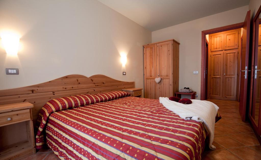 Łóżko lub łóżka w pokoju w obiekcie Residence Stalle Lunghe