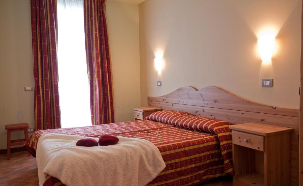 Łóżko lub łóżka w pokoju w obiekcie Residence Stalle Lunghe