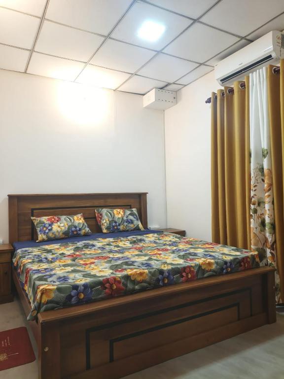 a bedroom with a large bed in a room at Minsara Villa in Ahangama