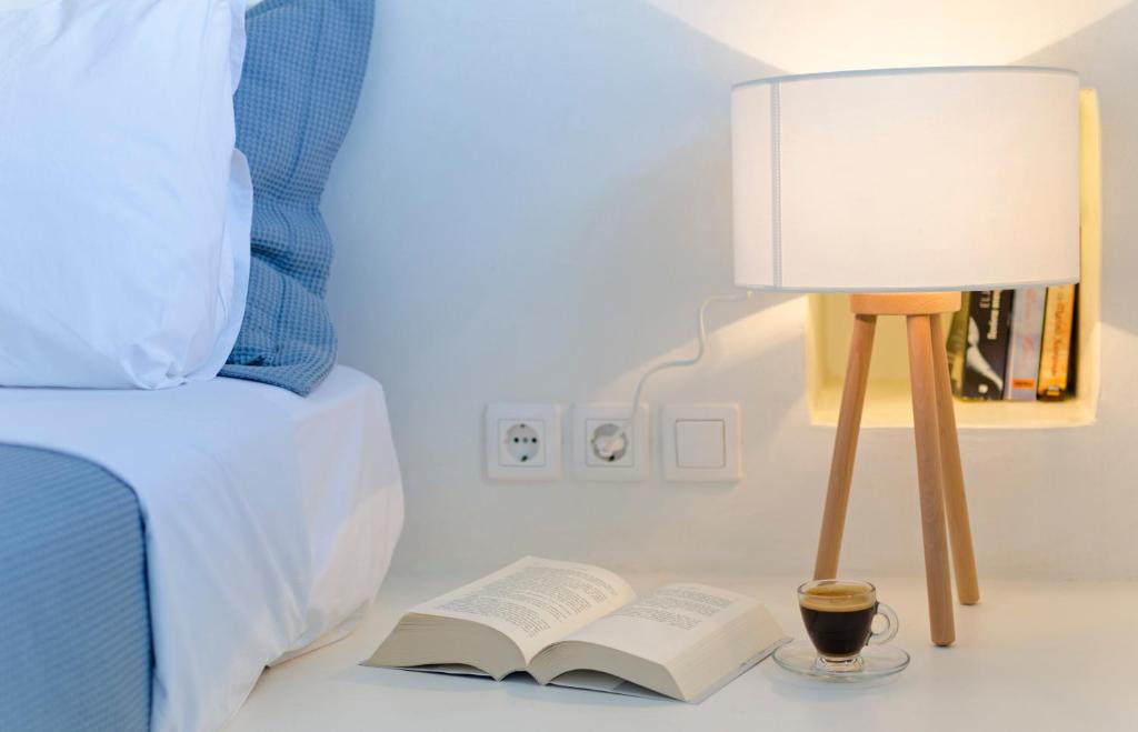 Postel nebo postele na pokoji v ubytování Astypalaia Hotel Palace