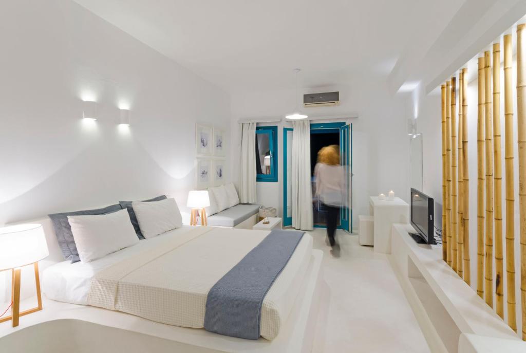Postel nebo postele na pokoji v ubytování Astypalaia Hotel Palace