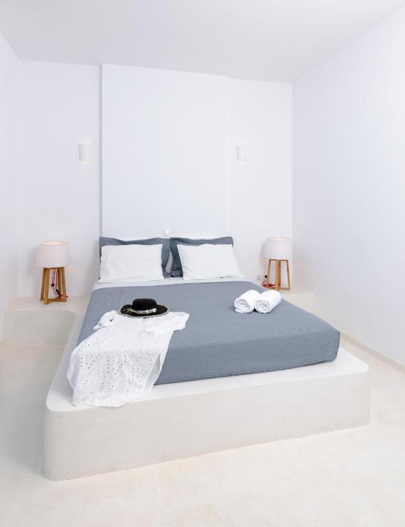 Postel nebo postele na pokoji v ubytování Astypalaia Hotel Palace