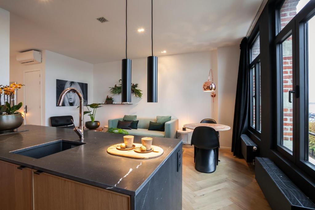 Köök või kööginurk majutusasutuses Kaai11 - Riverview Lofts & Suites