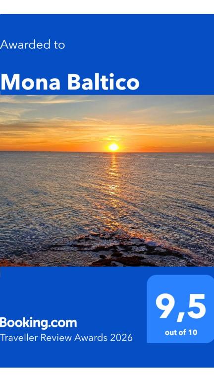 a picture of the sun setting over the ocean at Mona Baltico-Traveller Awards 2026 in Torrevieja