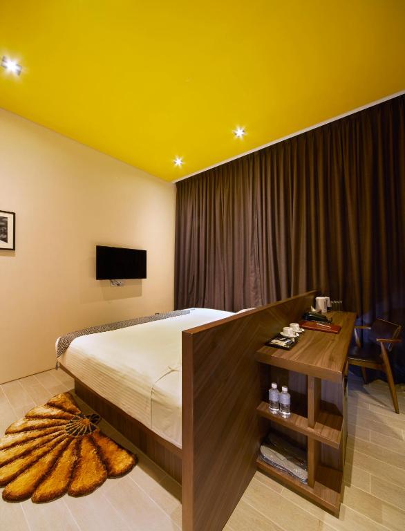 TV a/nebo společenská místnost v ubytování Hotel Yan