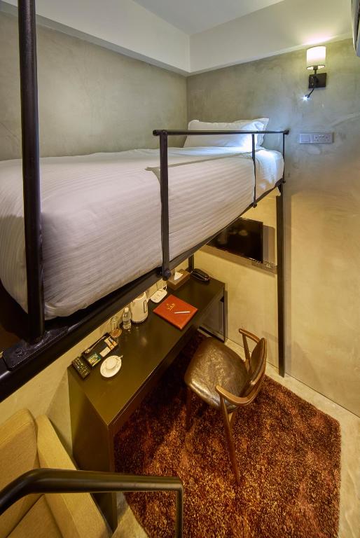 Postel nebo postele na pokoji v ubytování Hotel Yan