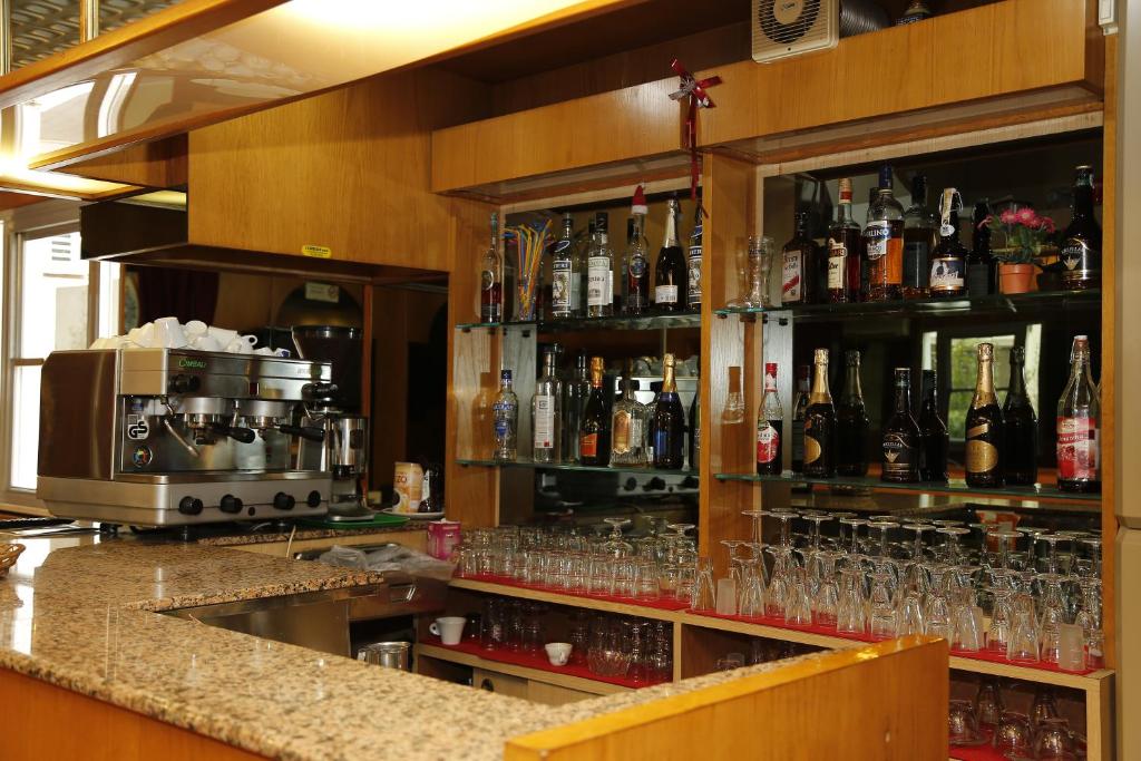 Lounge nebo bar v ubytování Hotel Villa Dina