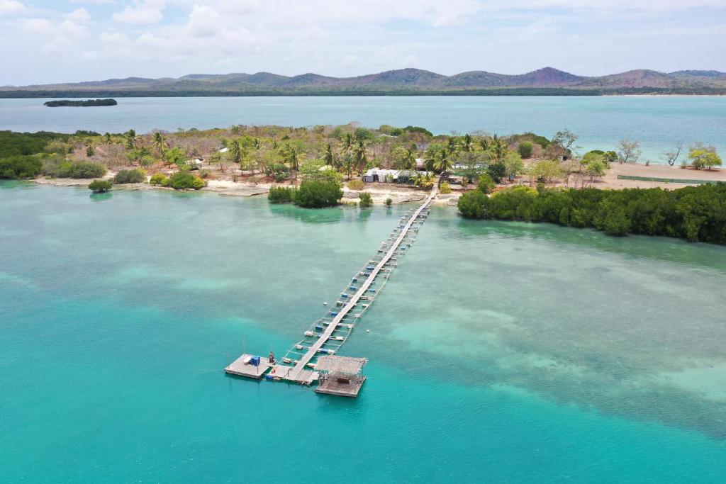 an island in the middle of a large body of water at Roko Island in Thursday Island