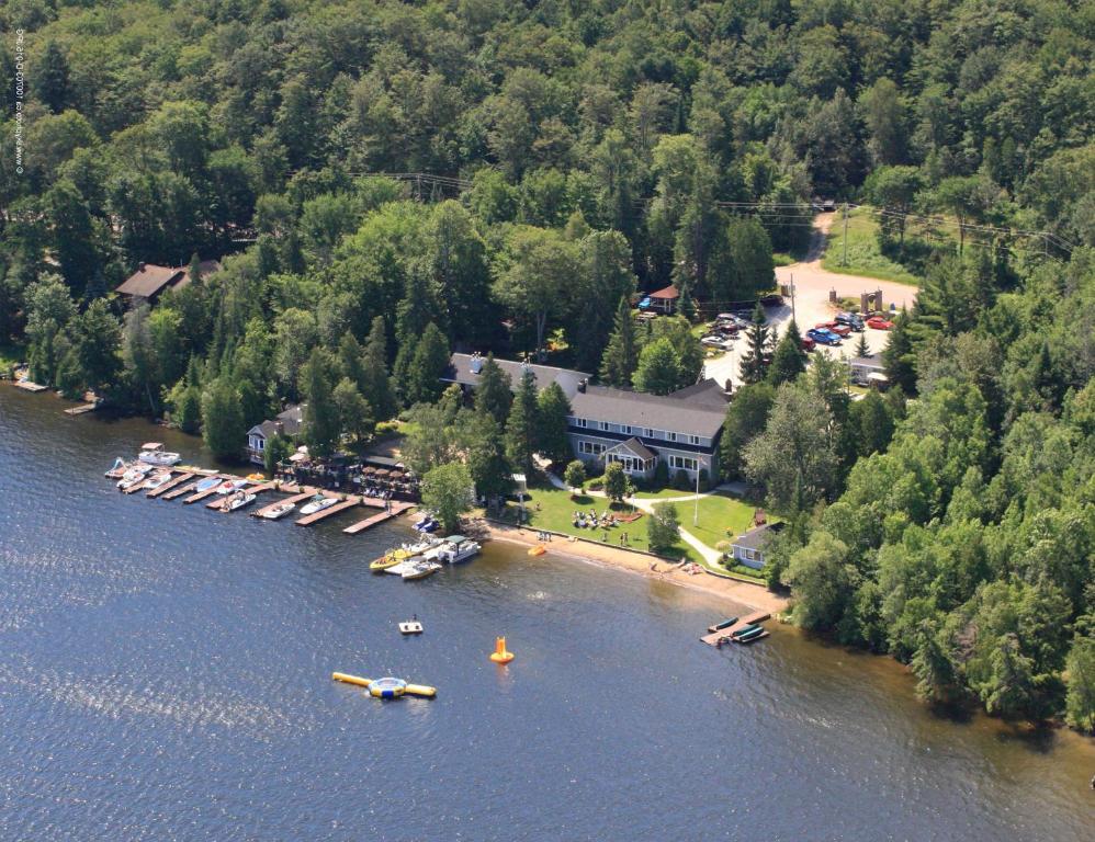 a large body of water with boats on it at Bonnie View Inn in Haliburton