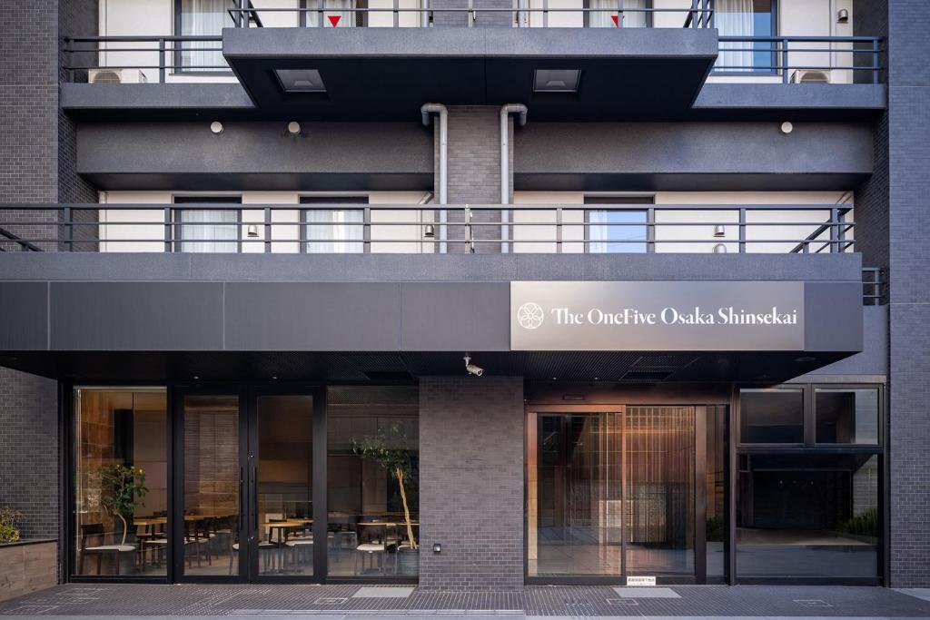 a building with a sign that reads the ontario oaks chicago at The OneFive Osaka Shinsekai in Osaka