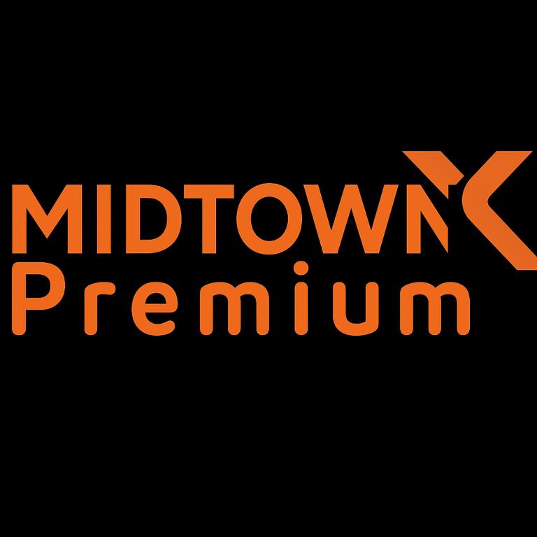 a sign with the words midumsremium in orange at MXP Special Rooms in Saskatoon