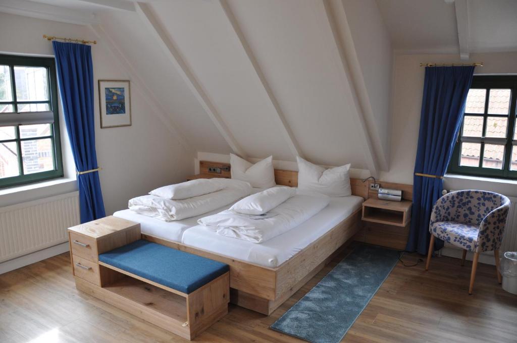 Postel nebo postele na pokoji v ubytování Hotel Witthus GmbH & CoKG