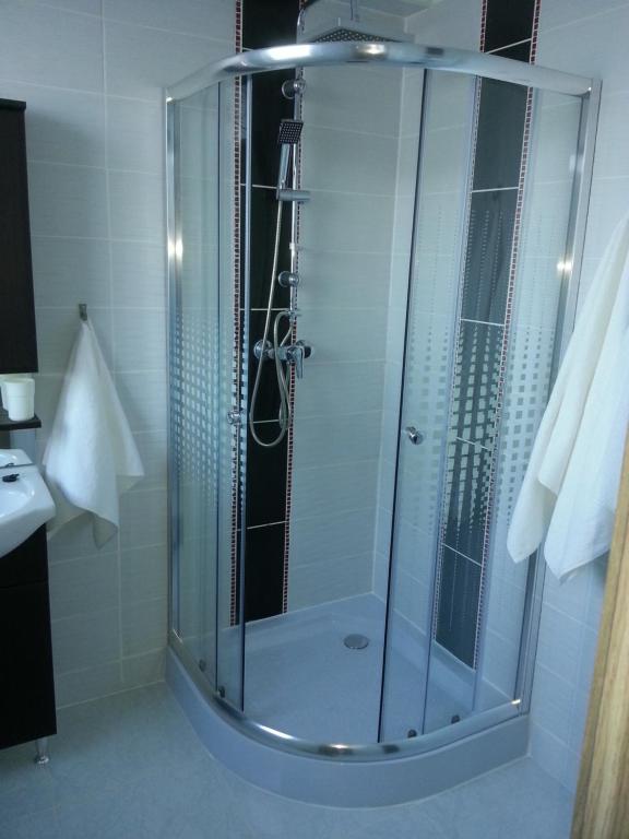 A bathroom at Downtown Apartment Miskolc