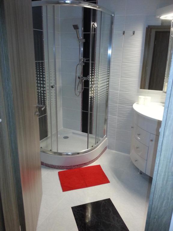 A bathroom at Downtown Apartment Miskolc