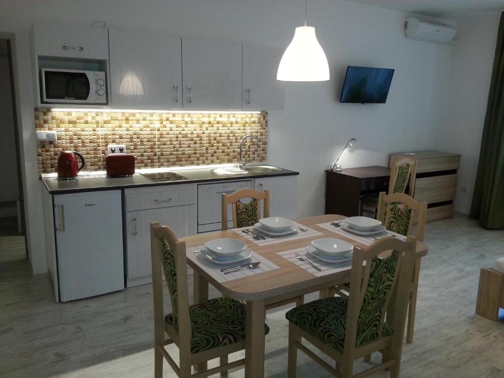 A kitchen or kitchenette at Downtown Apartment Miskolc