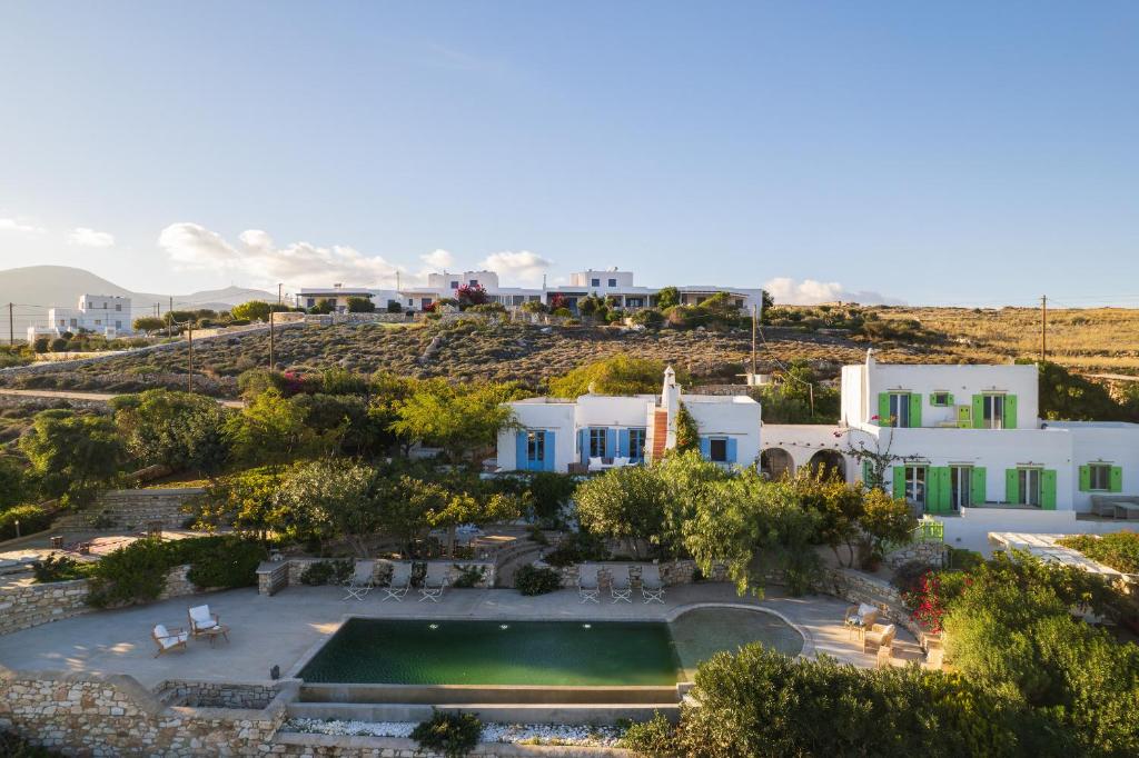 an aerial view of a villa with a swimming pool at Morfia Villas in Piso Livadi