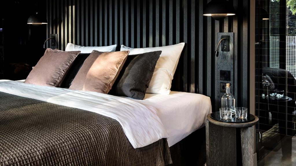 Postel nebo postele na pokoji v ubytování Mauritzhof Hotel Münster