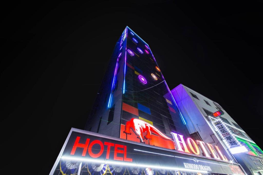 a hotel is lit up in blue and purple at Yeongdeungpo Komodo Hotel in Seoul
