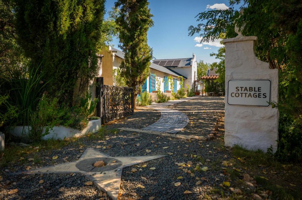 a star on the side of a street with a sign at Kuilfontein Stable Cottages in Colesberg