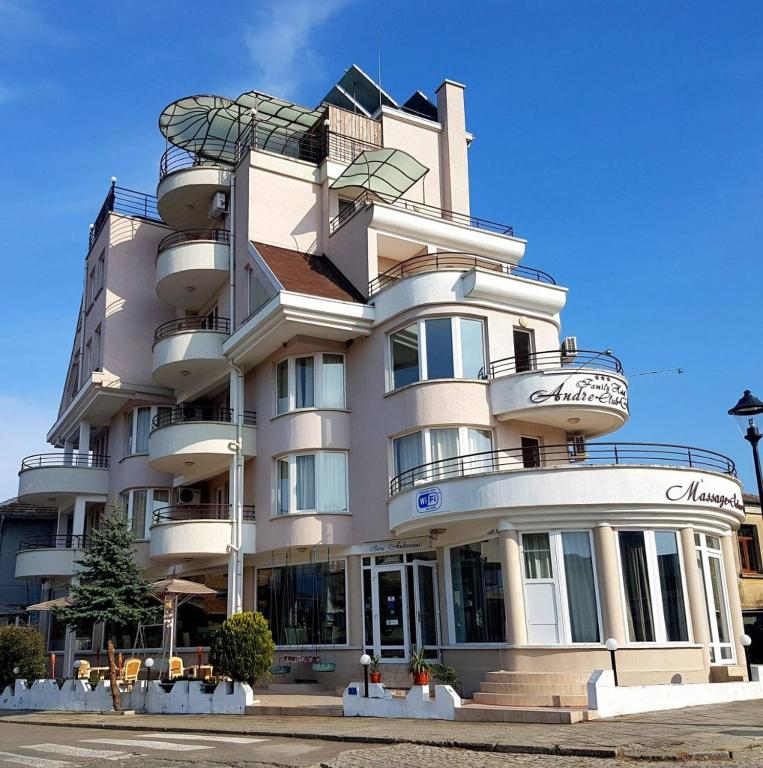a large white building with a spiral at Hotel Andre in Burgas