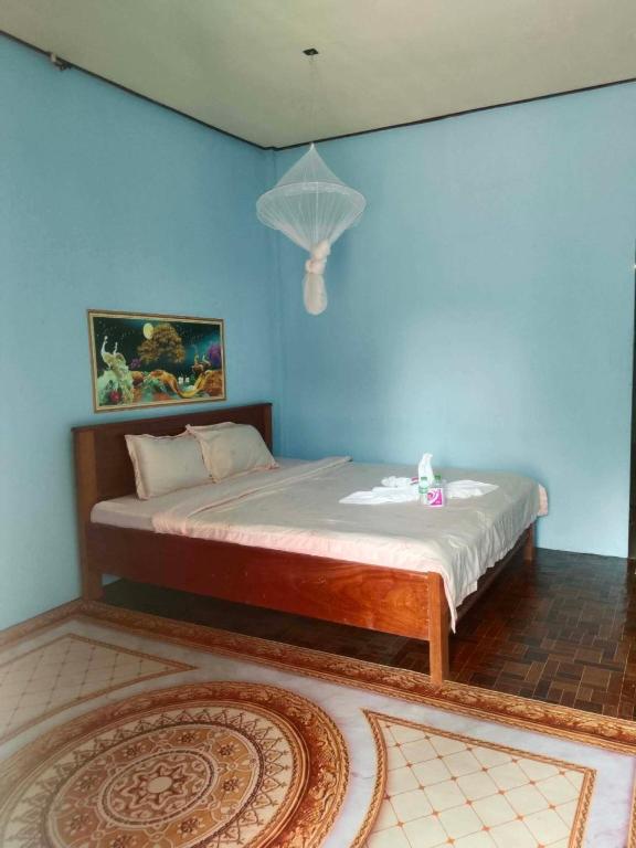 Llit o llits en una habitació de Anan guesthouse