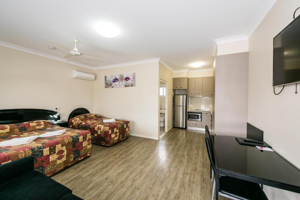 TV a/nebo společenská místnost v ubytování Athena Studio Units