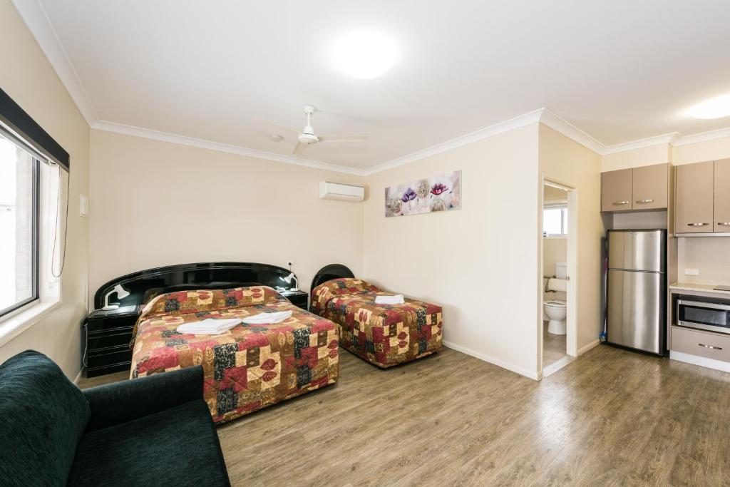 Kuchyň nebo kuchyňský kout v ubytování Athena Studio Units