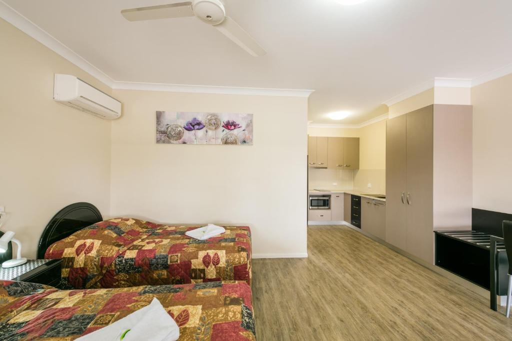 Postel nebo postele na pokoji v ubytování Athena Studio Units