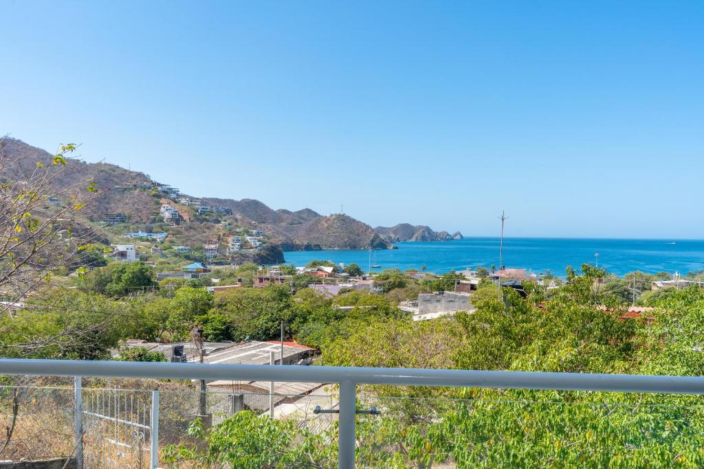 a view of the ocean from a balcony at Vito Hotel Boutique Taganga in Taganga