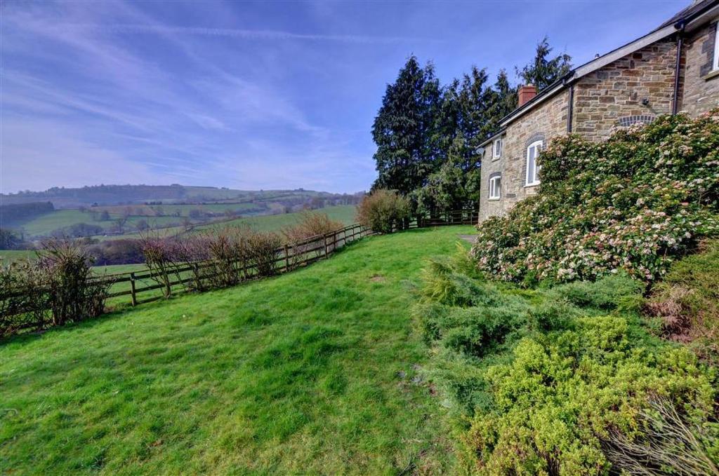 an empty field next to a brick building at 4 Bed in Presteigne oc-wak235 in Norton