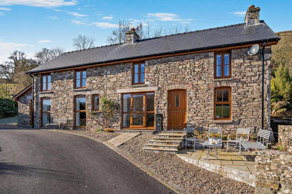 an old stone house with a driveway at 3 Bed in Defynnog oc-p33133 in Devynock