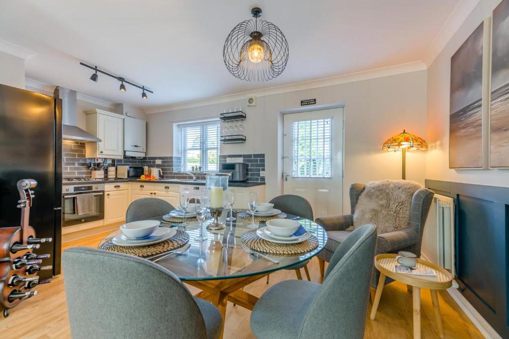 a kitchen and dining room with a table and chairs at 2 Bed in Alnwick oc-e33447 in Embleton