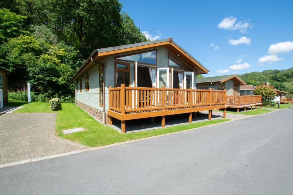 a house with a large deck on the side of the road at 2 Bed in Stepaside oc-pw9184 in Stepaside