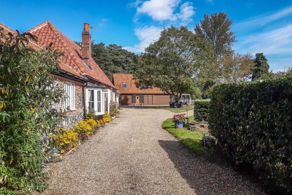 an image of a house with a driveway at 2 Bed in Eccles oc-l27507 in Eccles