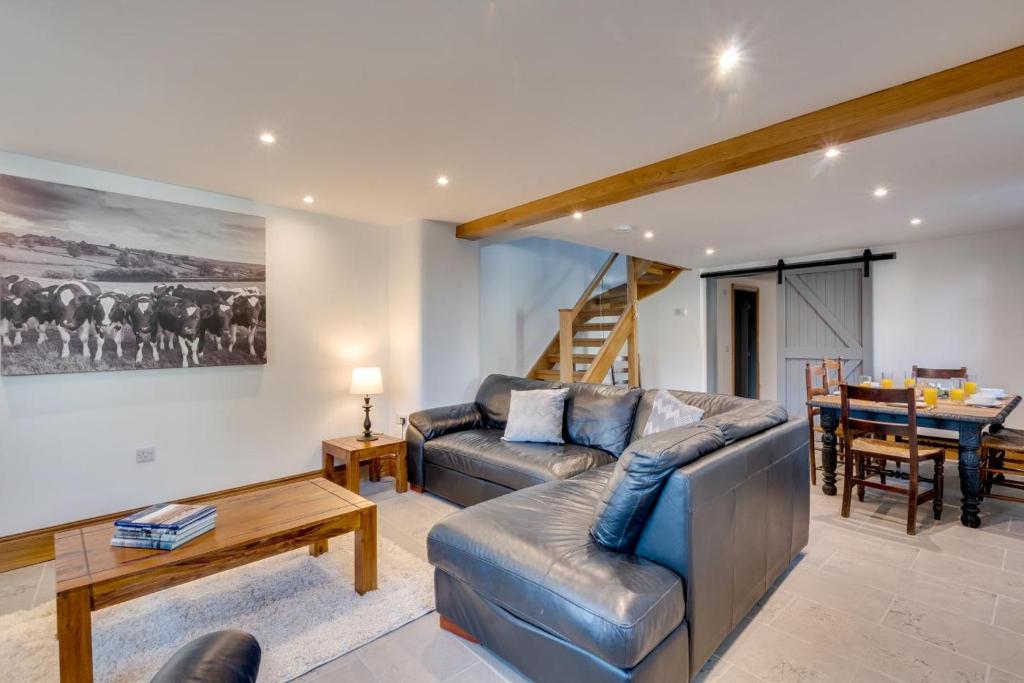 a living room with a couch and a table at 3 Bed in Burtersett oc-ds1043 in Hawes