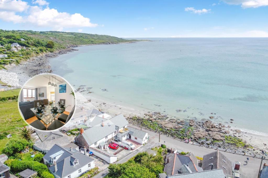 an aerial view of a beach with a house at 3 Bed in Coverack oc-b31082 in Coverack