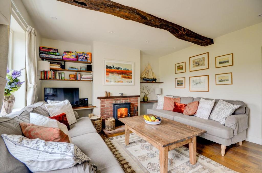 a living room with a couch and a table at 2 Bed in Little Barningham oc-1817 in Little Barningham