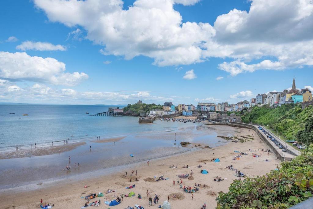 a view of a beach with people on it at 2 Bed in Tenby oc-w28987 in Tenby