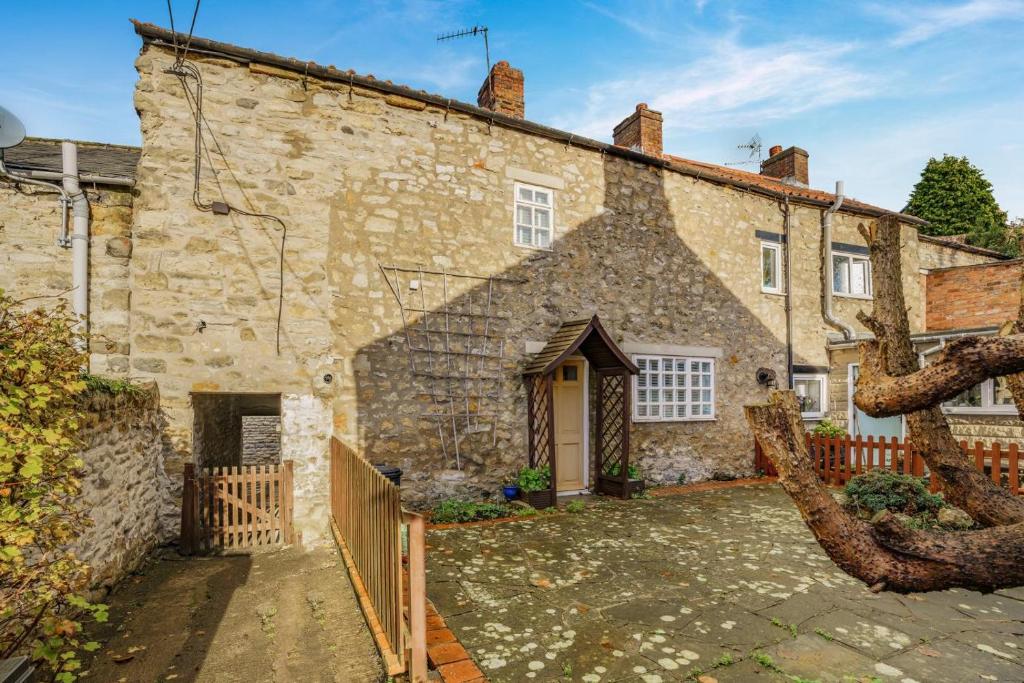 an old stone house with a gate and a fence at 3 Bed in Pickering oc-t33630 in Pickering