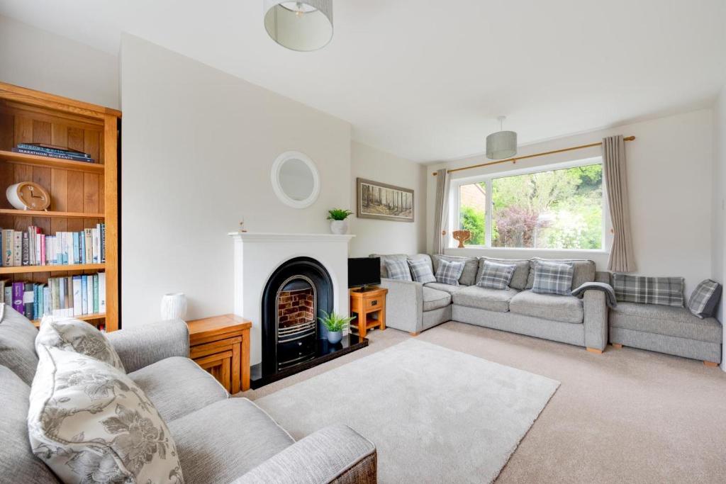 a living room with a couch and a fireplace at 2 Bed in Kelling oc-1716 in Kelling