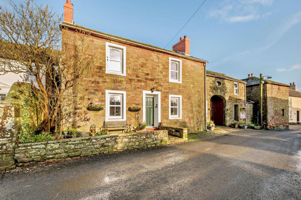 an old brick house with a driveway at 3 Bed in Bowness-on-Solway oc-p28797 in Bowness-on-Solway