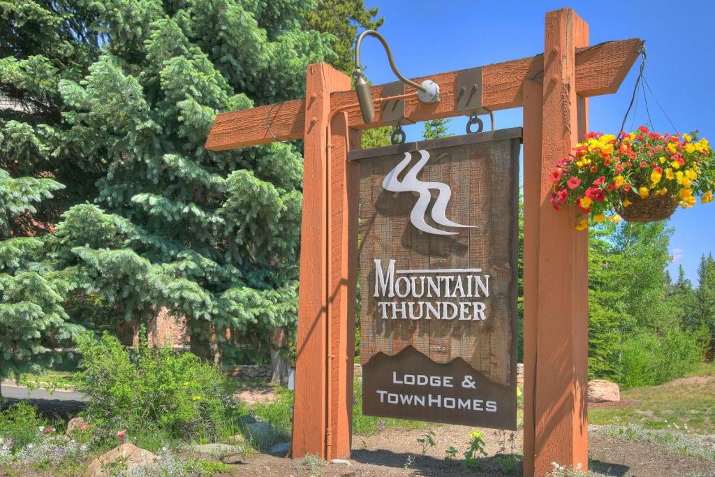 a sign for the mountain hunter lodge and townhomes at Mountain Thunder Lodge, A Vail Resorts Property in Breckenridge