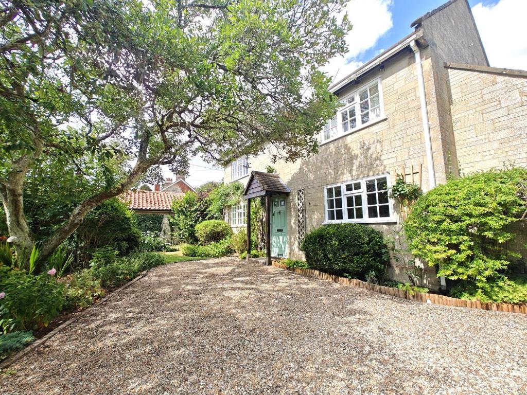 an empty driveway in front of a house at 2 Bed in Chilmark oc-w32753 in Chilmark