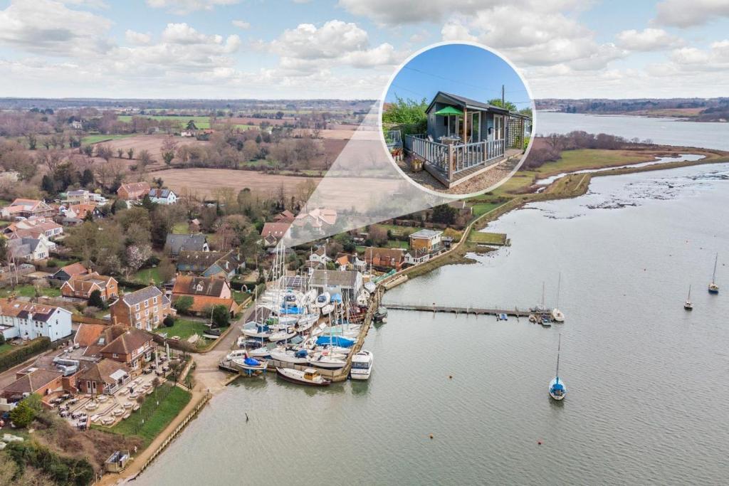 an aerial view of a marina with a house at 1 Bed in Waldringfield oc-thstu in Waldringfield