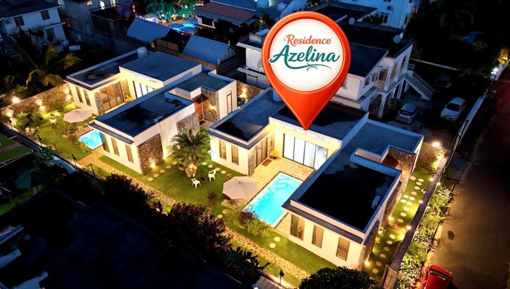an overhead view of a house with a sign in front of it at Residence Azelina in Pointe aux Canonniers