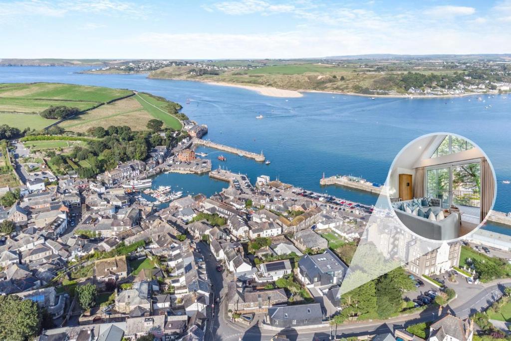 an aerial view of a city and a body of water at 2 Bed in Padstow oc-t29016 in Padstow